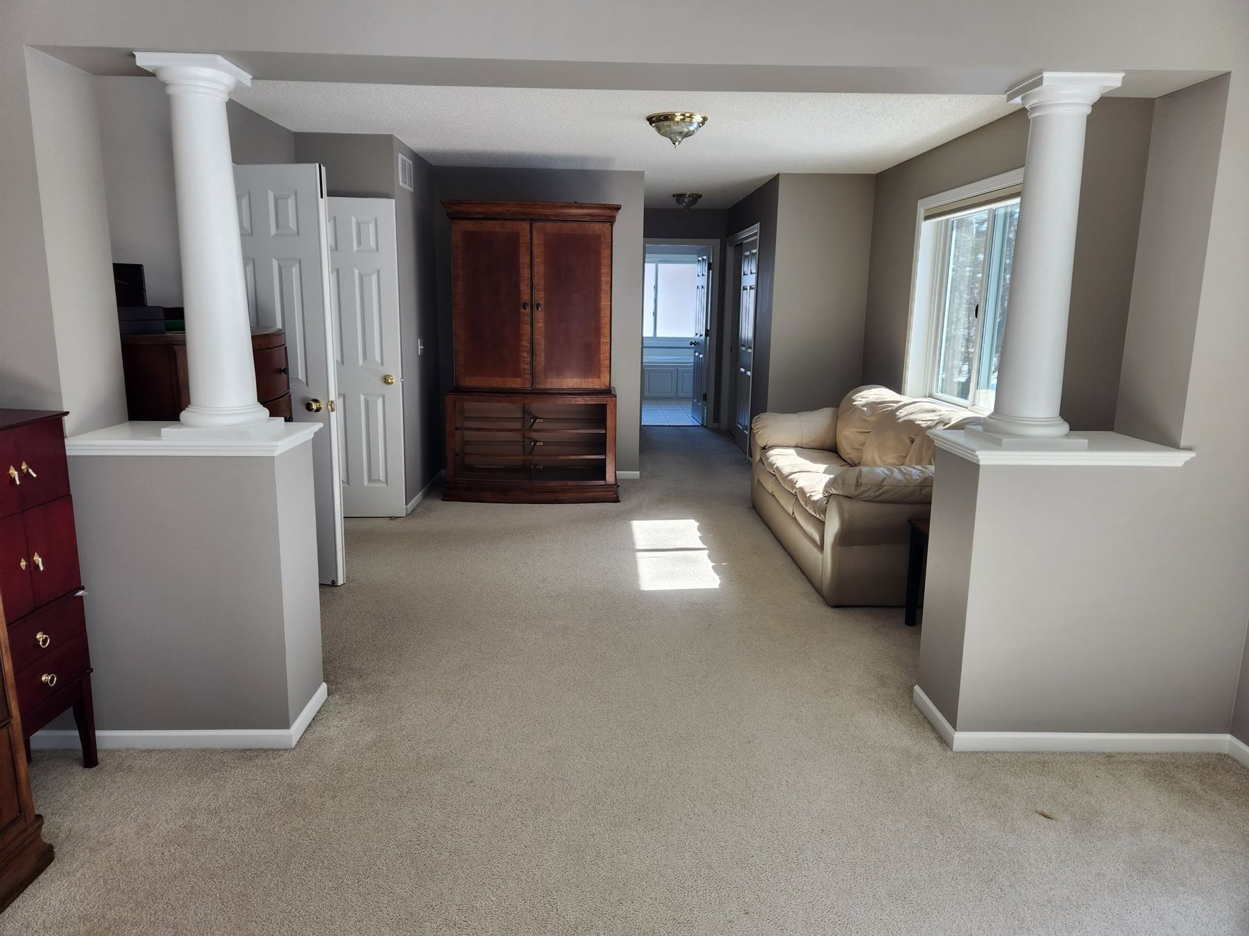 Sitting area with columns and half walls after repainting