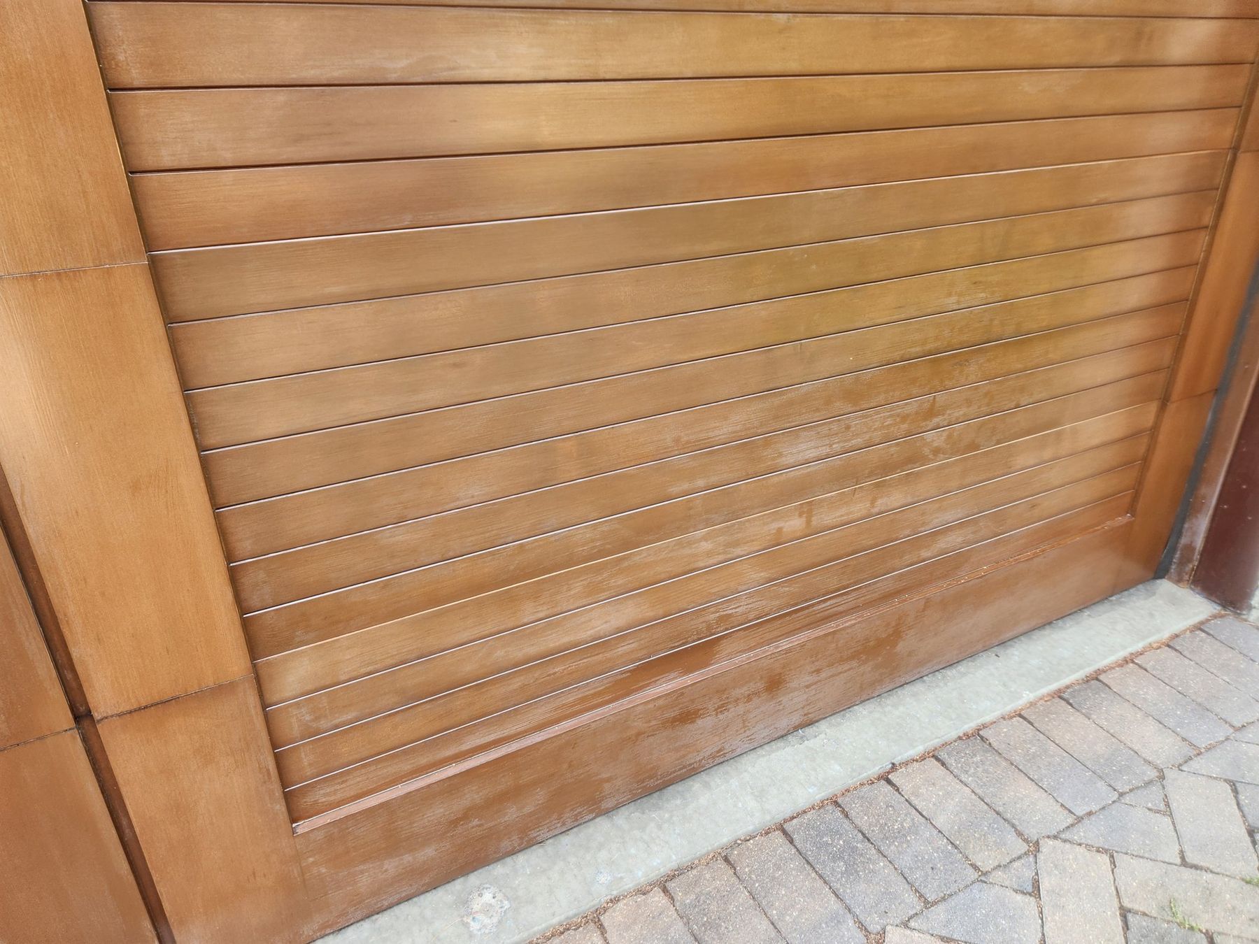 Wood garage door refinished