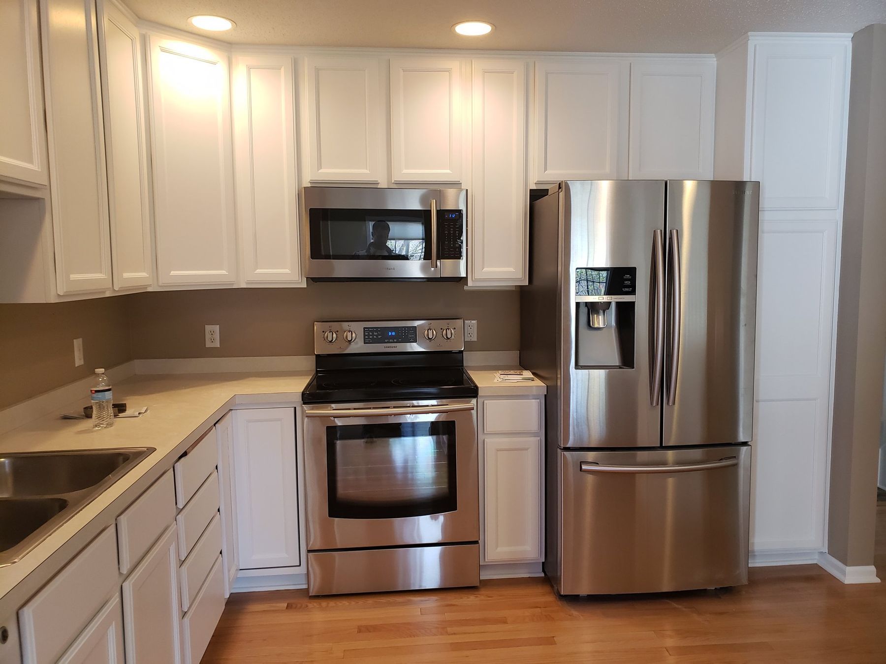 Golden oak kitchen cabinets sprayed white