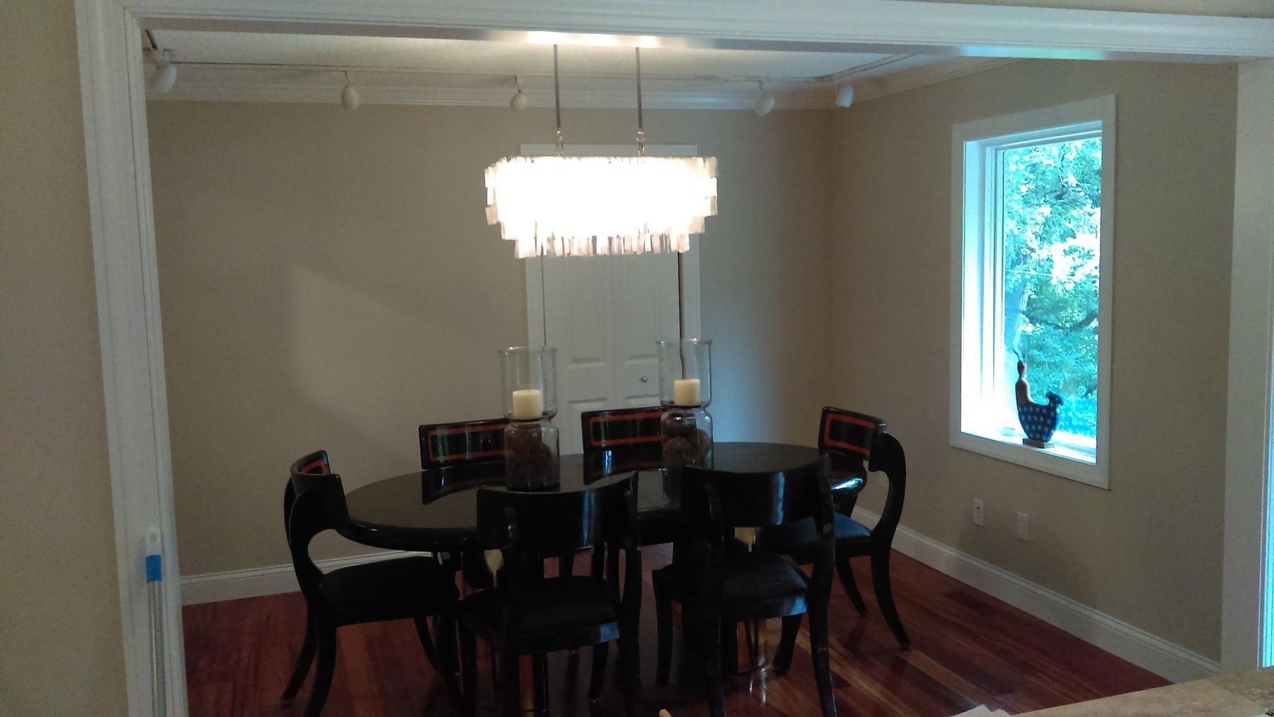 After: Dining room: dark charcoal walls to light greige