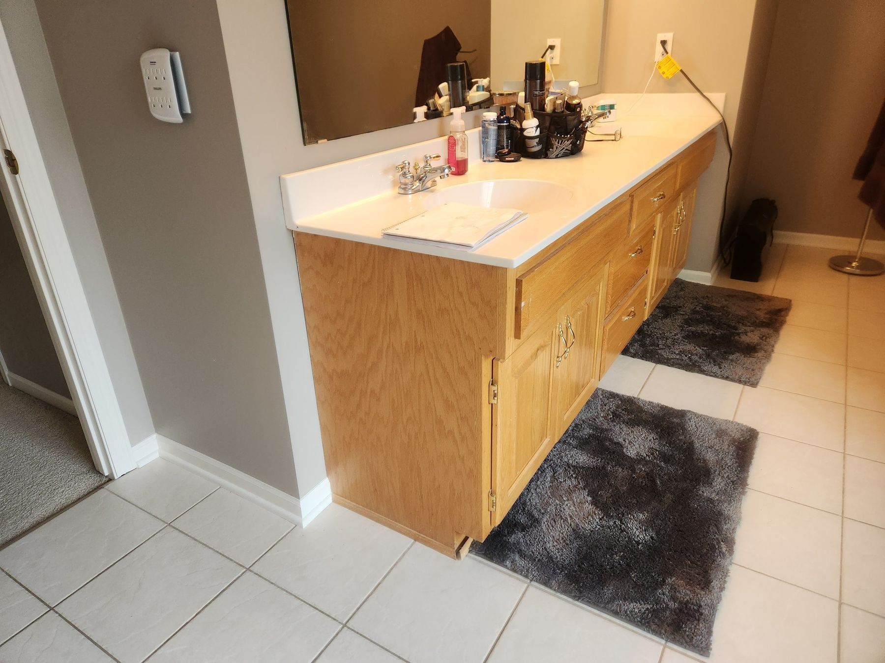 Before: Primary vanity: golden oak to dark charcoal enamel