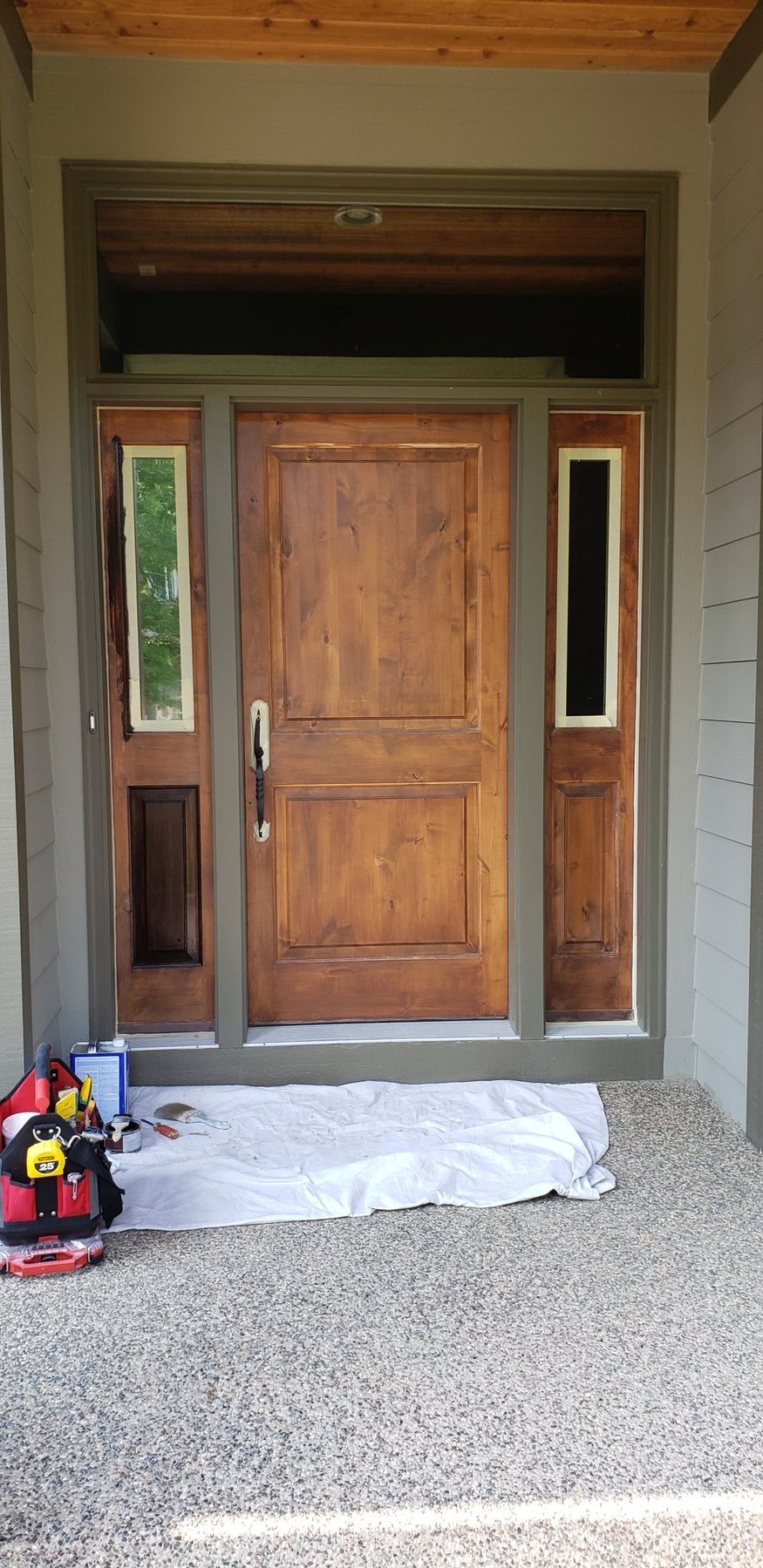 Before: Front door and sidelights: faded orange finish to a deep brown gel stain under spar varnish