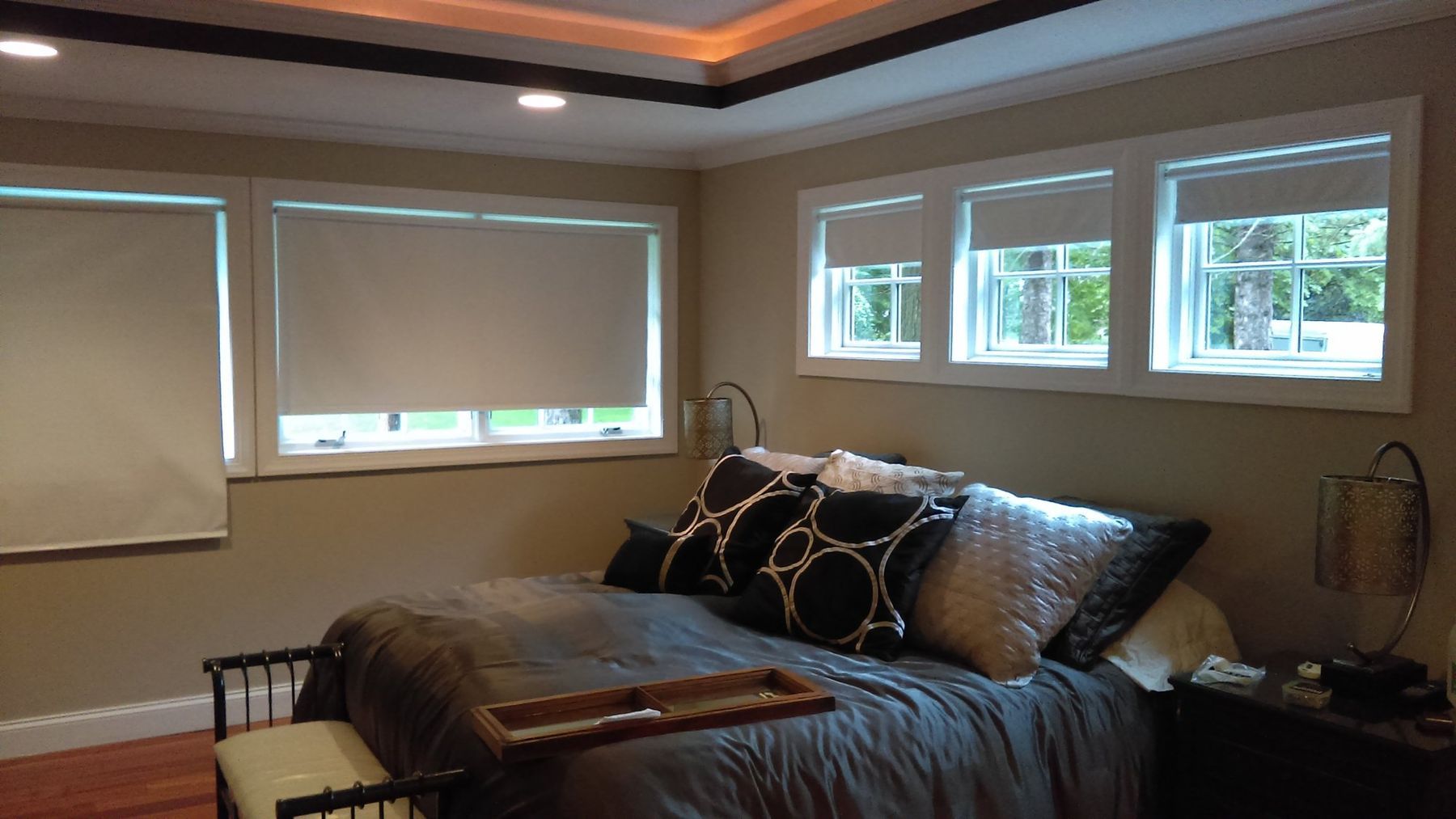 After: Primary bedroom: near-black walls to light greige