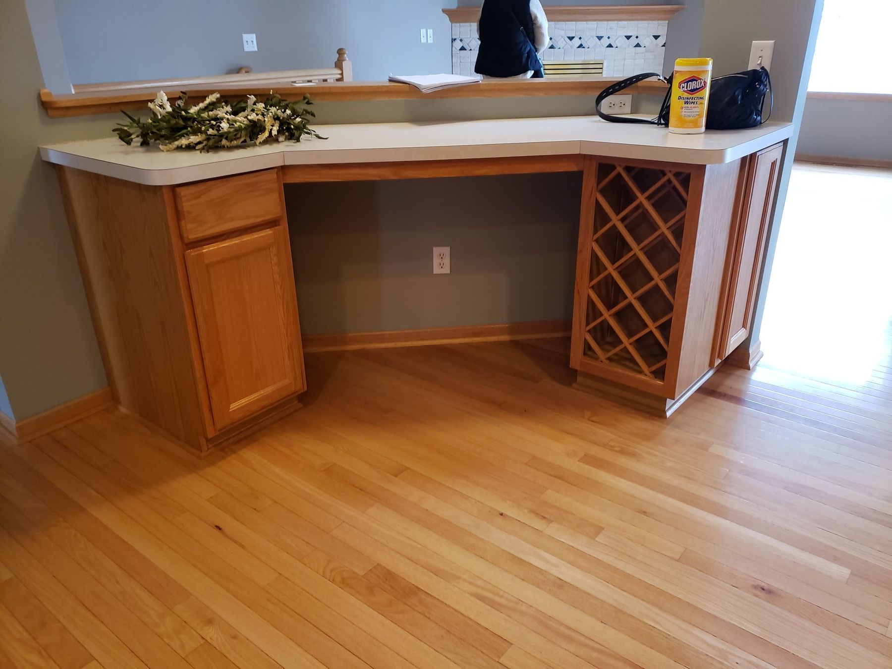 Before: Built-in desk and wine rack: golden oak to white