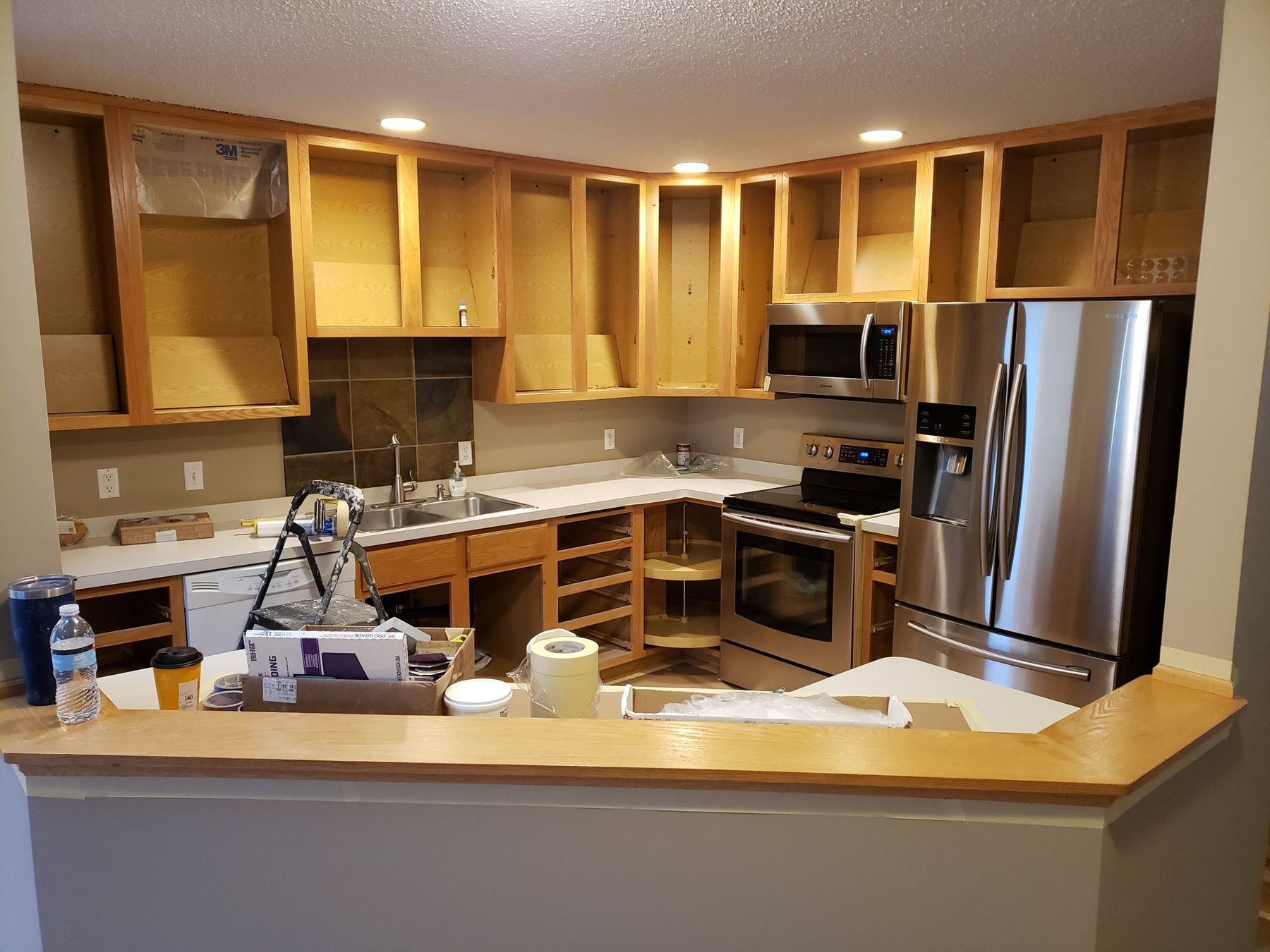 Doors removed, cabinet boxes cleaned and ready for prep